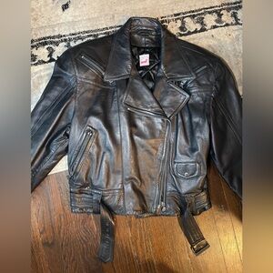 Mondi vintage leather biker jacket , with shoulder pads. Made in Germany